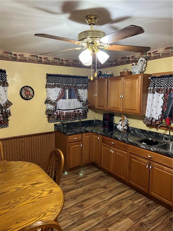 740 Chestnut Street New Castle, PA 16101 - Photo 10 of 16 a kitchen with stainless steel appliances granite countertop a stove a sink and a microwave