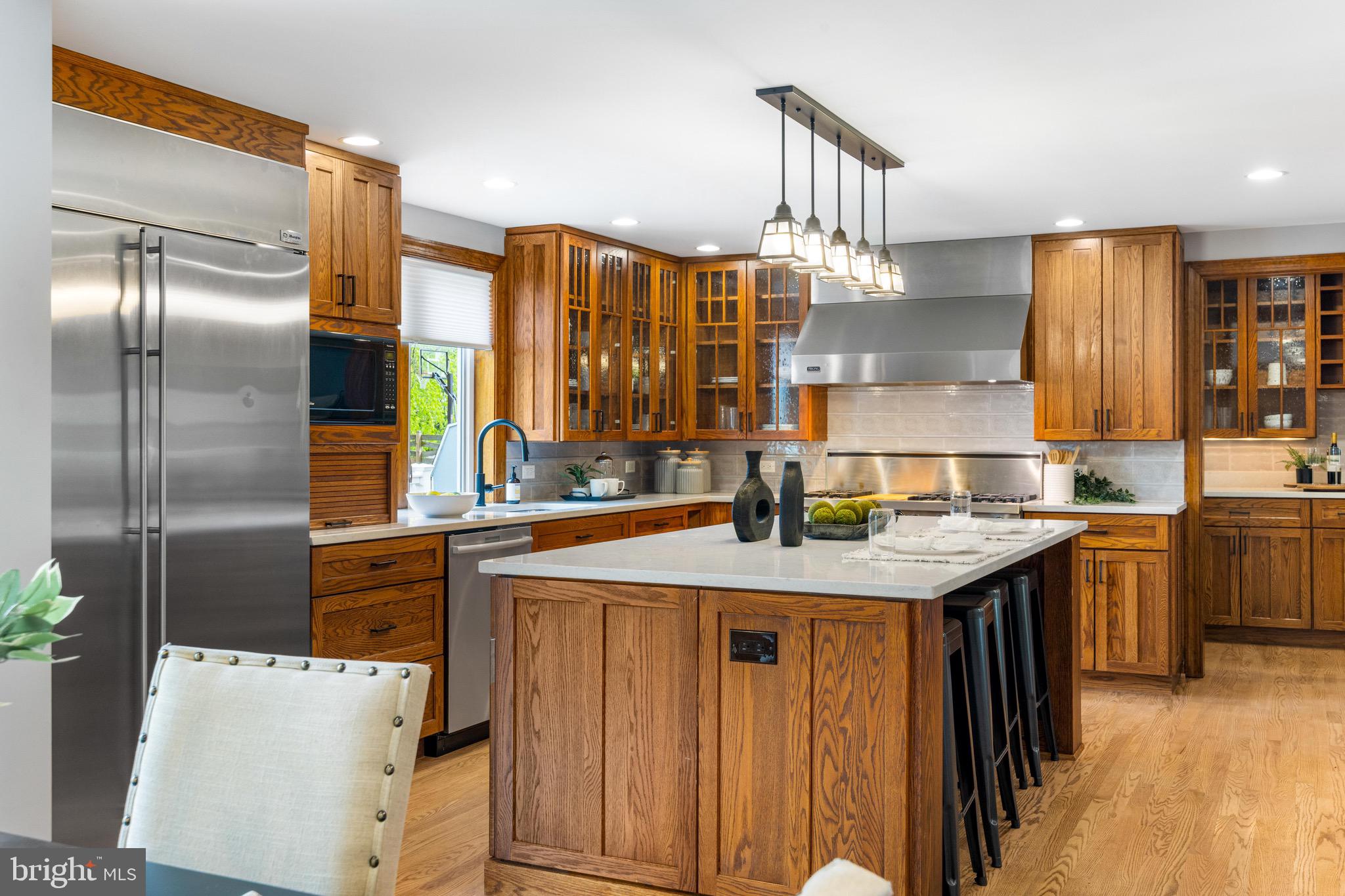 8735 Doves Fly Way Laurel, MD 20723 - Photo 1 of 64 a kitchen with stainless steel appliances granite countertop a sink a stove and a refrigerator