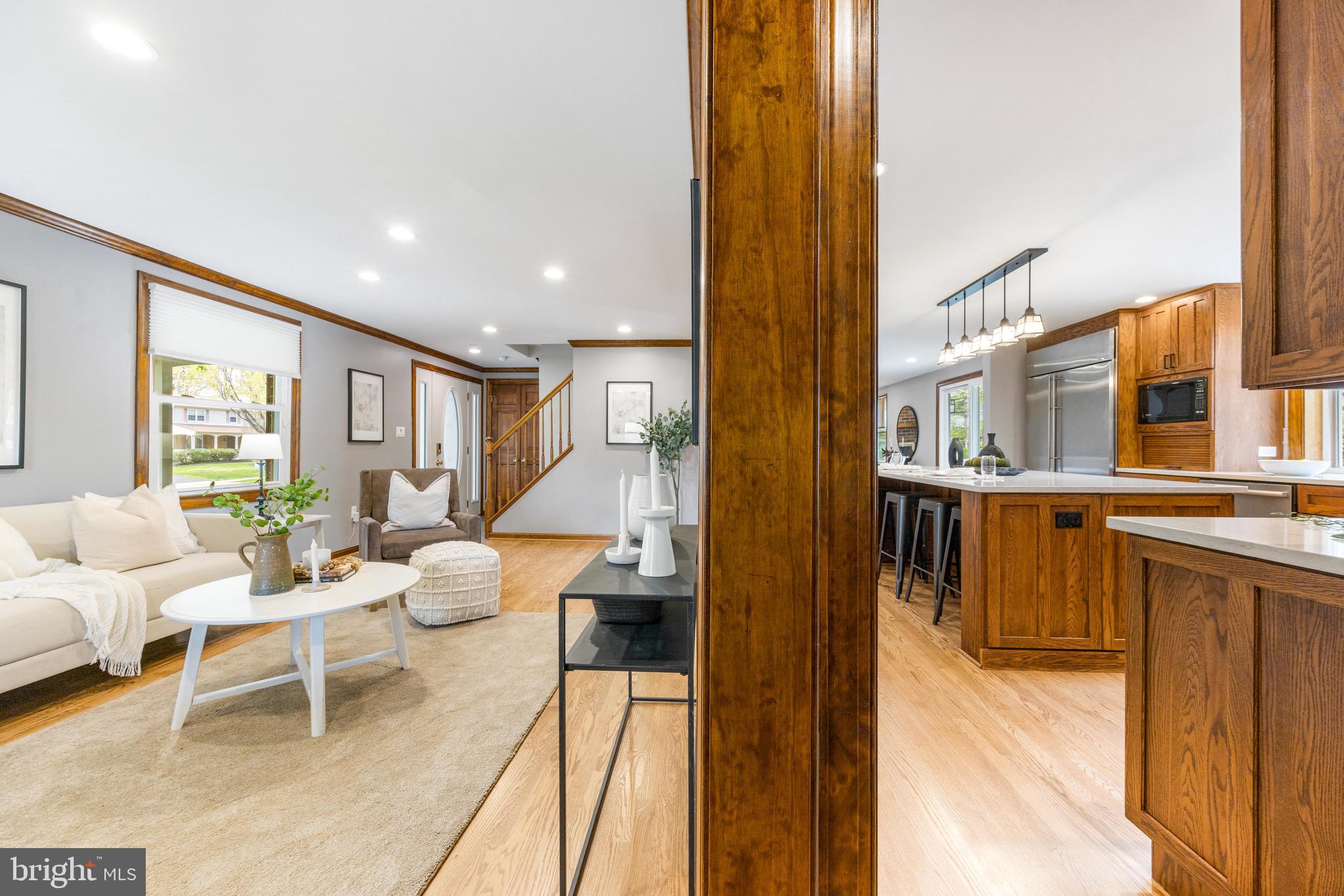 8735 Doves Fly Way Laurel, MD 20723 - Photo 15 of 64 a living room with furniture and a large window