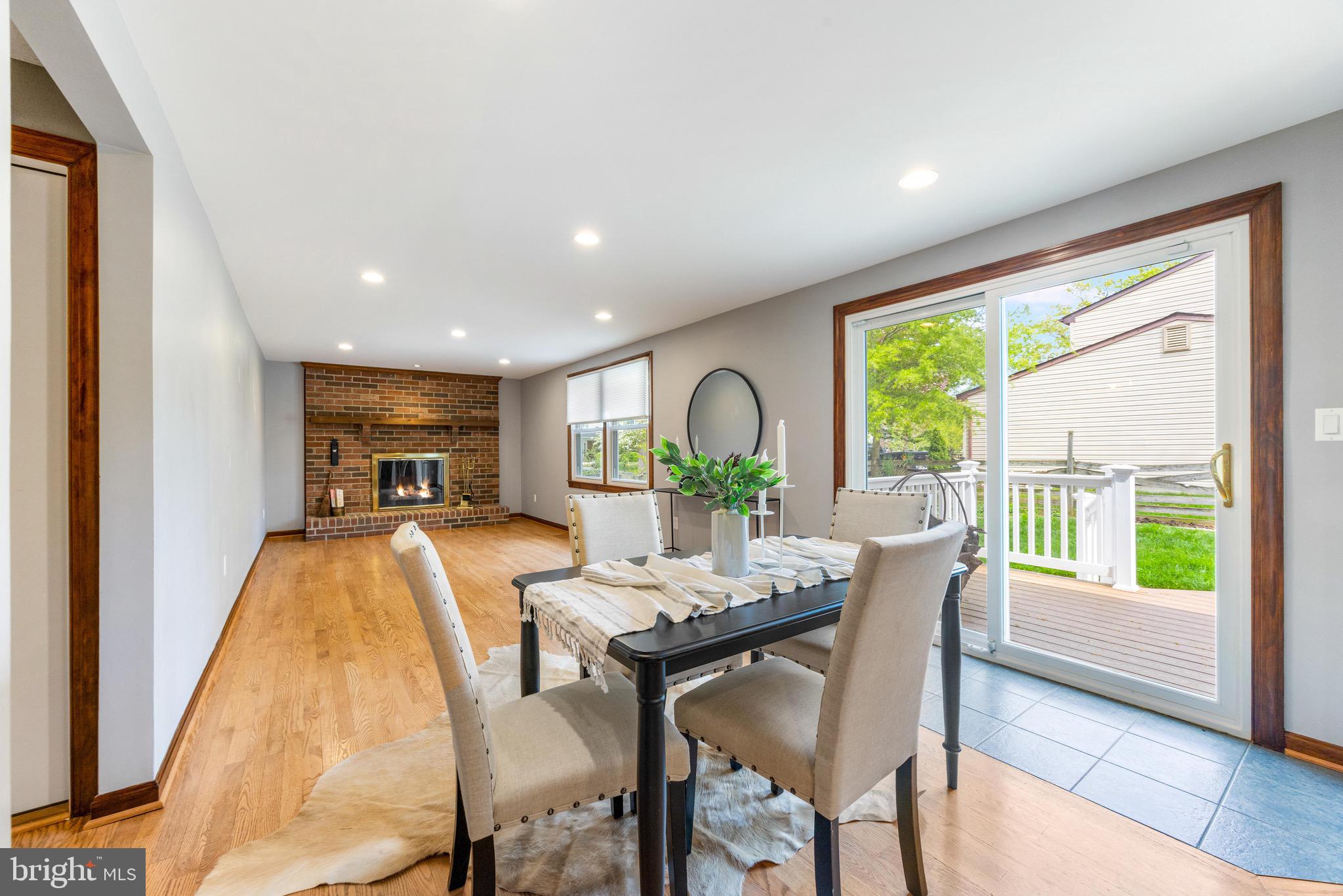 8735 Doves Fly Way Laurel, MD 20723 - Photo 27 of 64 a view of a dining room with furniture window and outside view