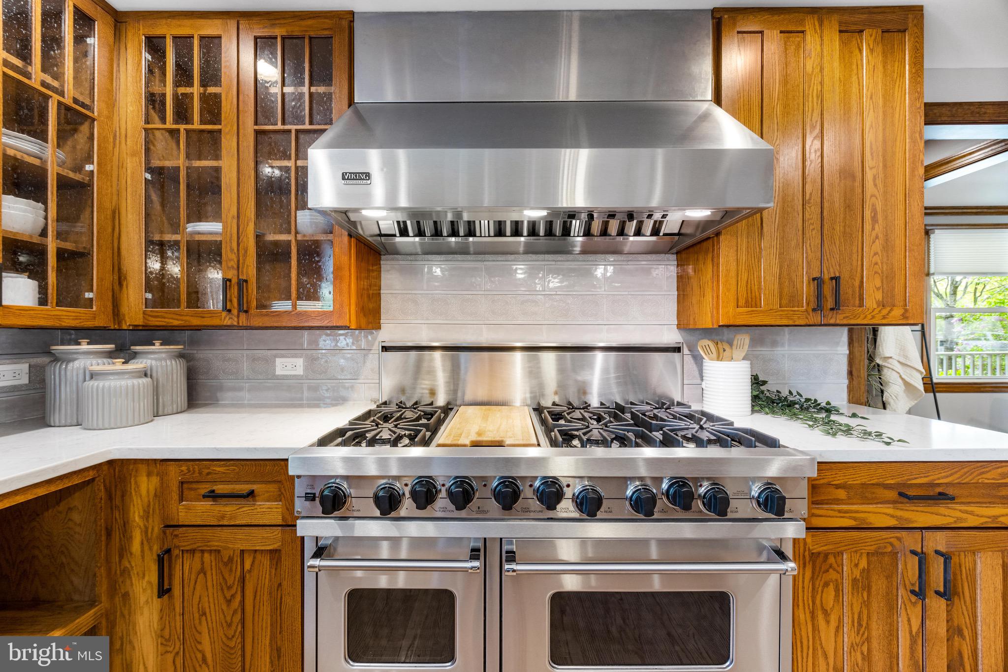 8735 Doves Fly Way Laurel, MD 20723 - Photo 4 of 64 a kitchen with a stove and a sink