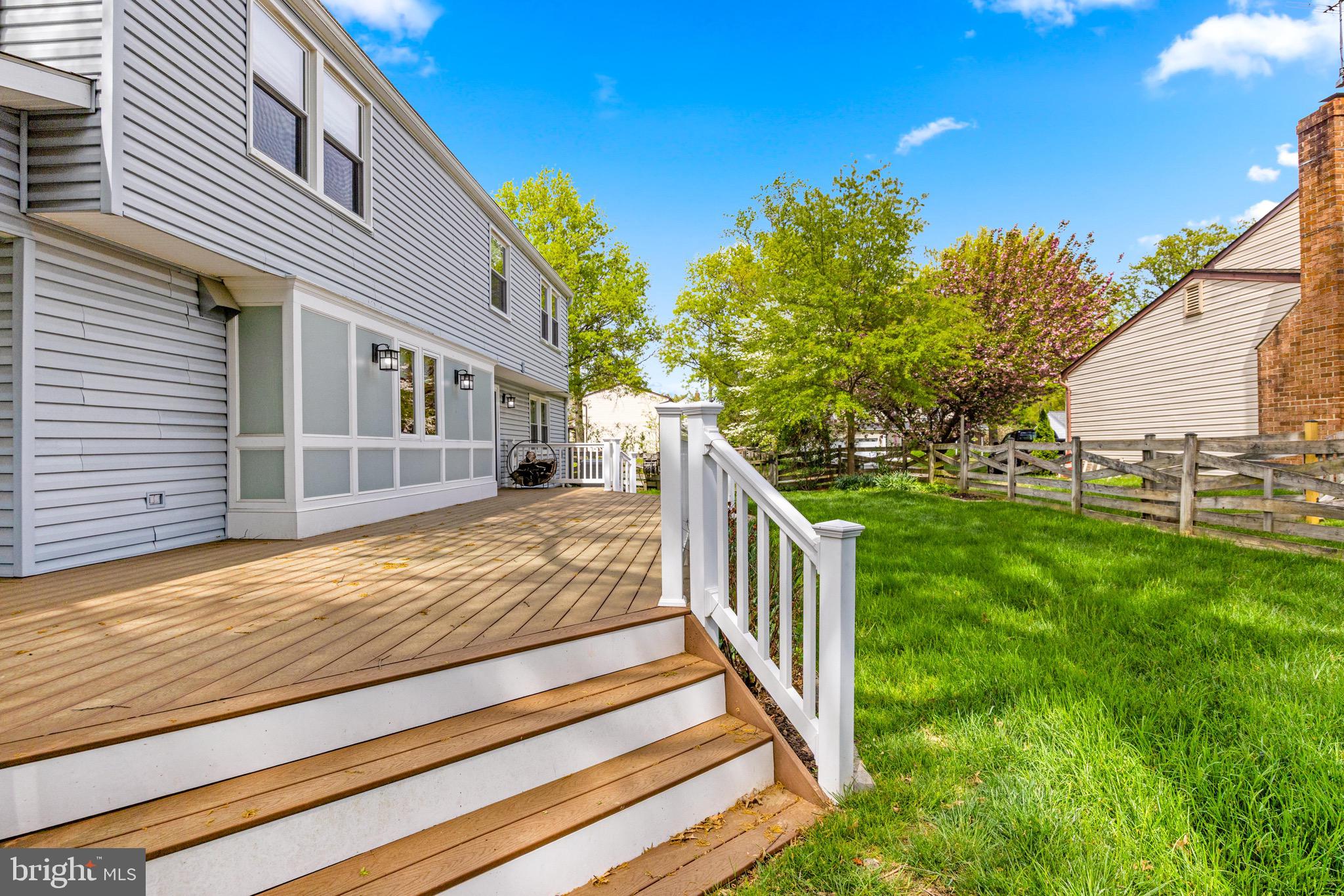 8735 Doves Fly Way Laurel, MD 20723 - Photo 58 of 64 a view of a house with backyard and deck
