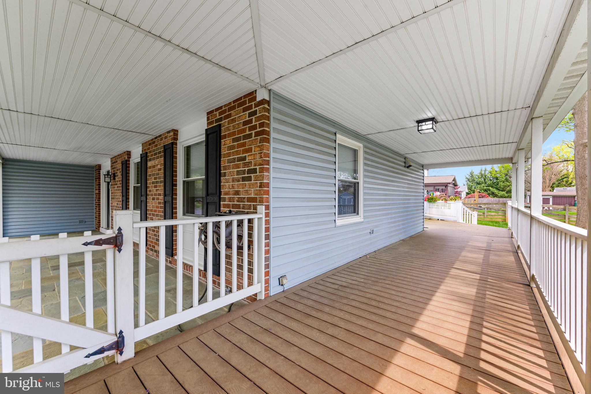 8735 Doves Fly Way Laurel, MD 20723 - Photo 60 of 64 a view of a house with a porch
