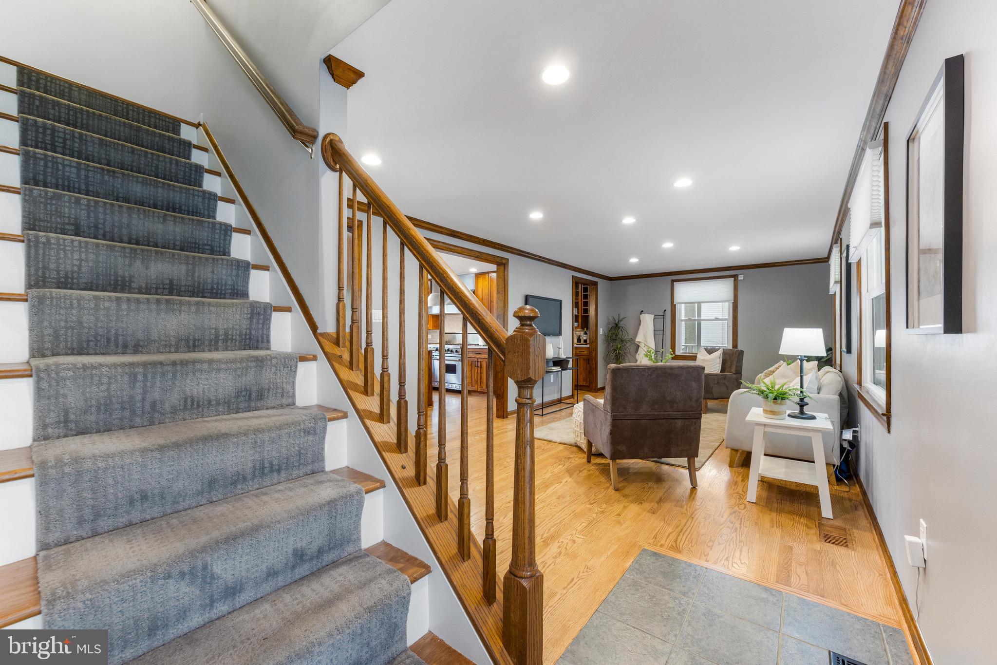 8735 Doves Fly Way Laurel, MD 20723 - Photo 10 of 64 a view of entryway and hall with wooden floor