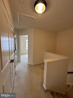 a view of a refrigerator in kitchen and a dishwasher a refrigerator