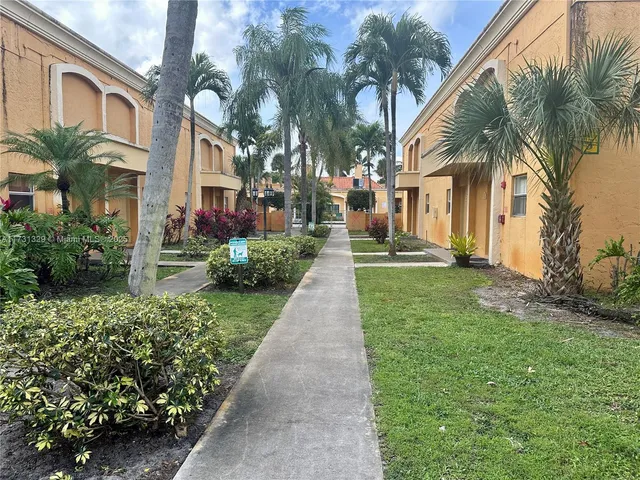 a view of a lake with building in front of it