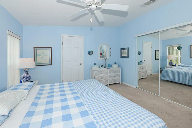 a white refrigerator freezer sitting inside of a kitchen
