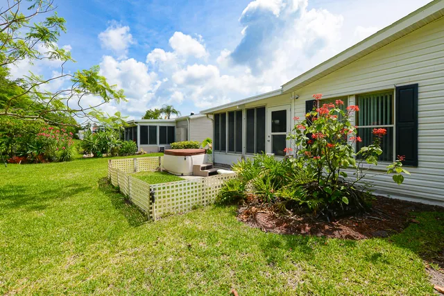 front view of a house with a small yard