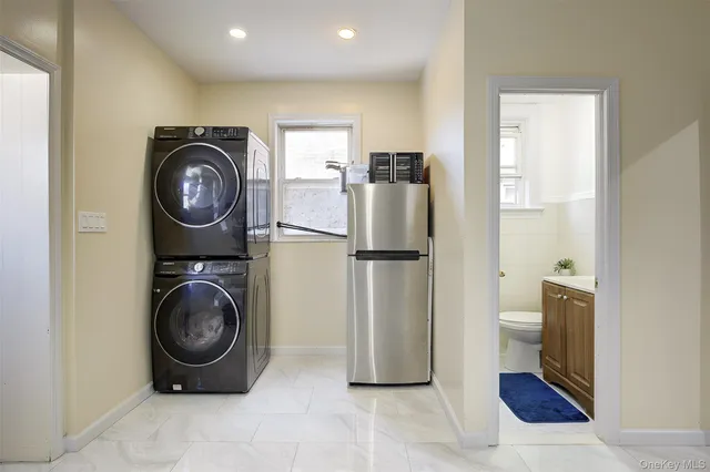 a utility room with dryer and washer