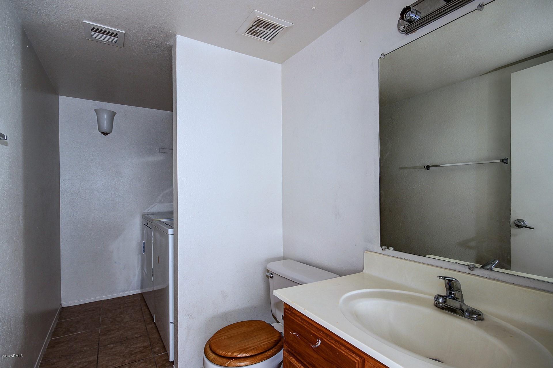 3511 East Baseline Road, Unit 1149 Phoenix, AZ 85042 - Photo 12 of 30 Powder Room & Laundry