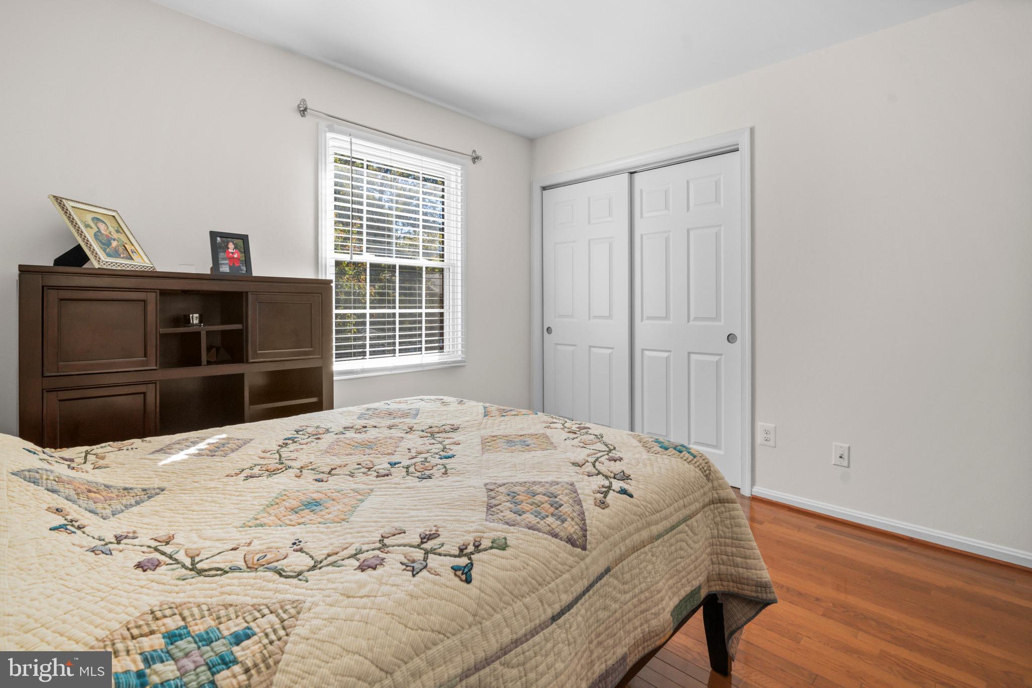 5824 Rexford Drive, Unit 731 Springfield, VA 22152 - Photo 20 of 30 a bedroom with a bed and a dresser