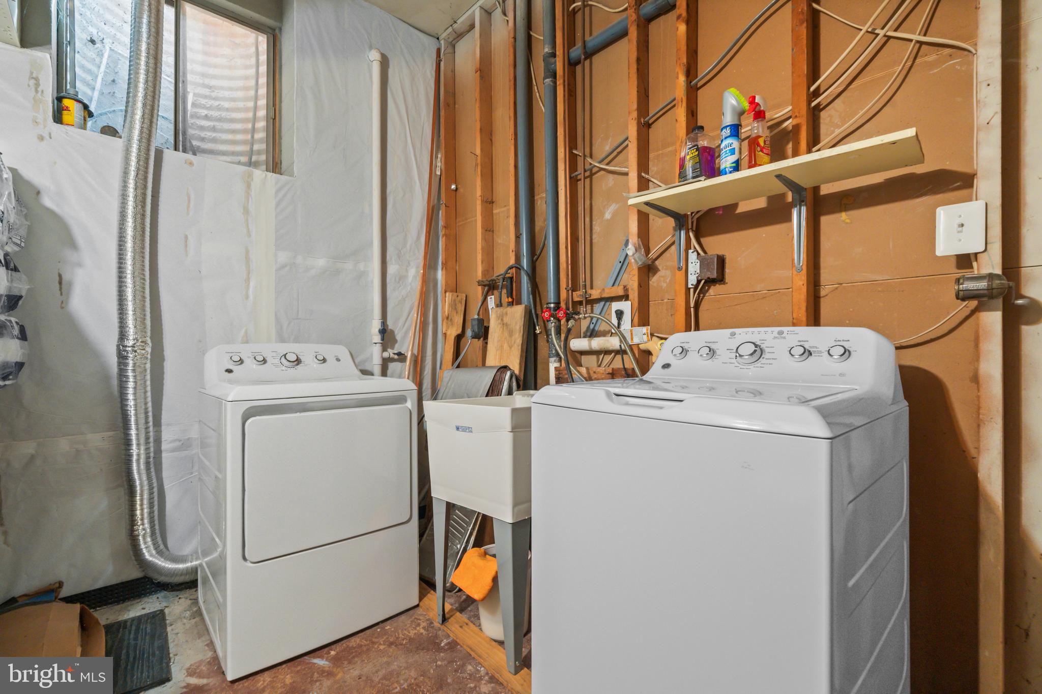 5824 Rexford Drive, Unit 731 Springfield, VA 22152 - Photo 24 of 30 a utility room with dryer and washer
