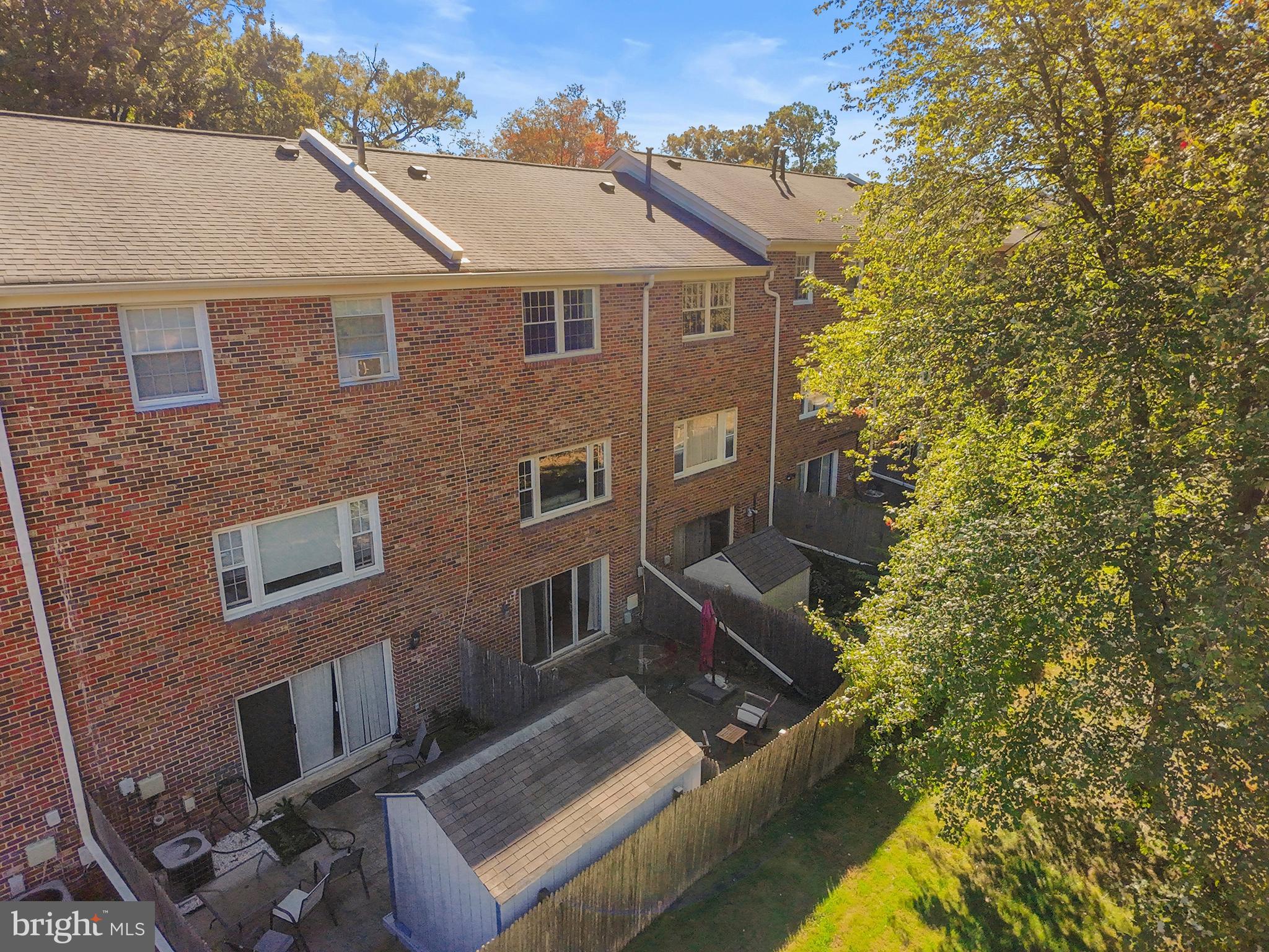 5824 Rexford Drive, Unit 731 Springfield, VA 22152 - Photo 26 of 30 front view of a house with a yard