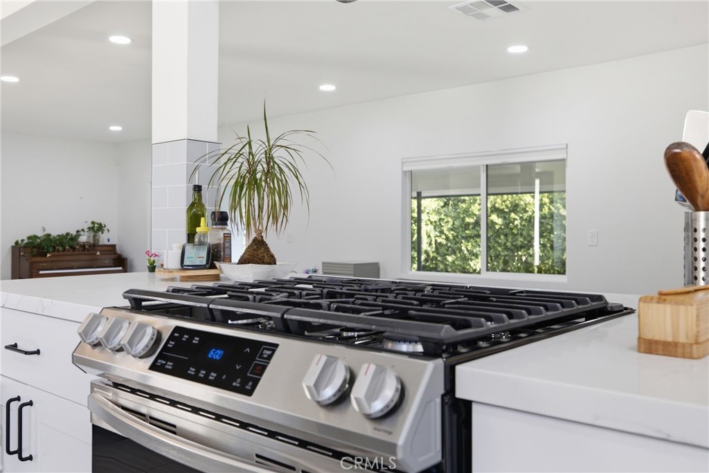 384 Colorado Street Arcadia, CA 91007 - Photo 24 of 51 a stove top oven sitting inside of a kitchen