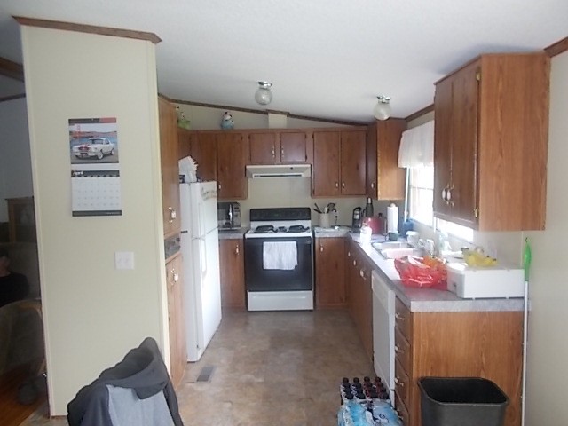 404 Franklin Road Gallatin, TN 37066 - Photo 12 of 19 a kitchen with stainless steel appliances granite countertop a refrigerator stove and sink