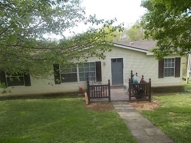 404 Franklin Road Gallatin, TN 37066 - Photo 3 of 19 a view of house with backyard and a garden