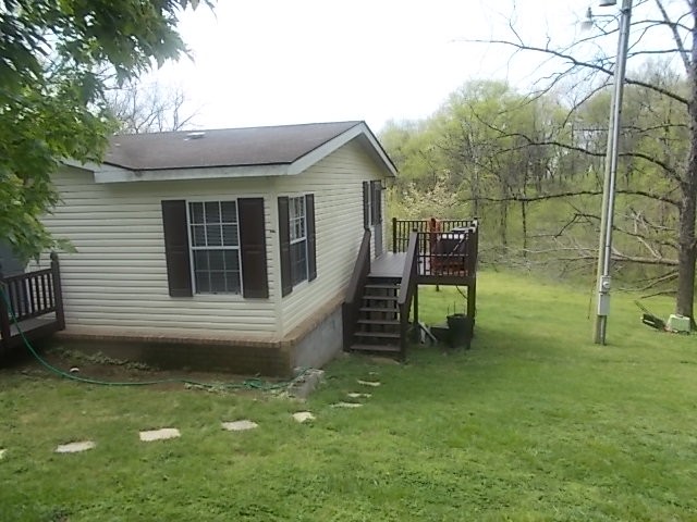 404 Franklin Road Gallatin, TN 37066 - Photo 4 of 19 a backyard of a house with table and chairs