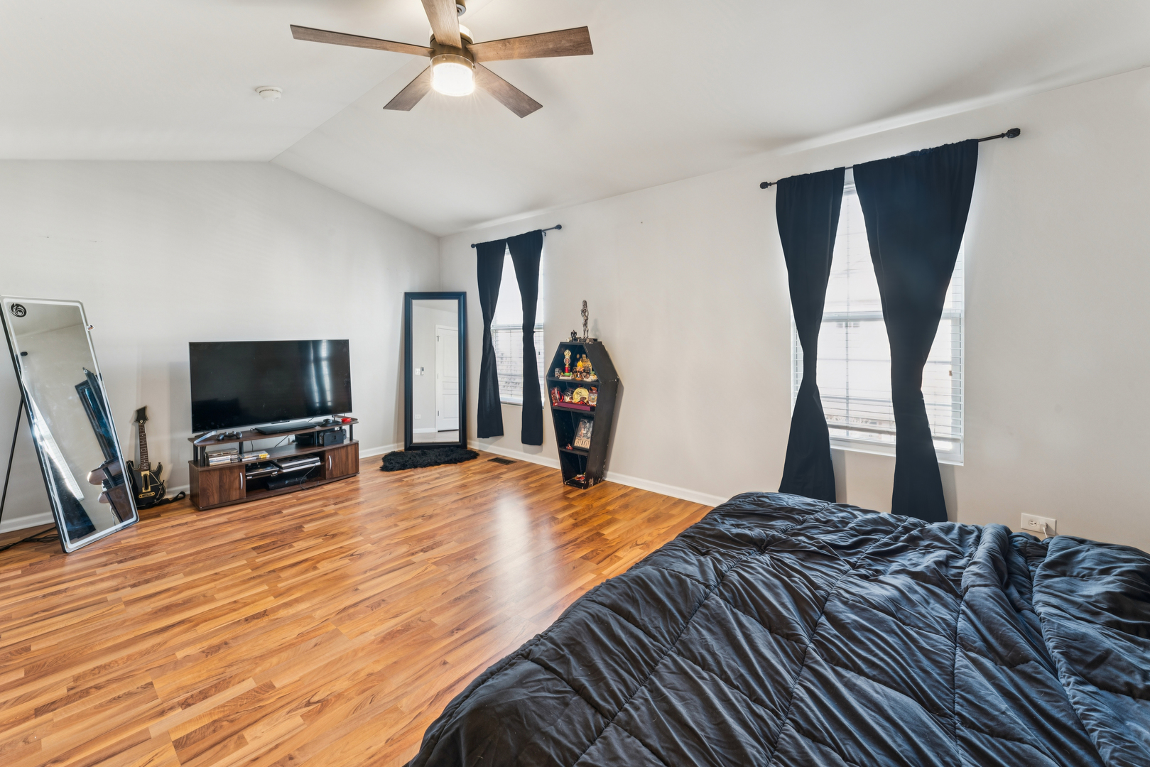 464 Valentine Way Oswego, IL 60543 - Photo 15 of 30 a bedroom with a bed and a flat screen tv