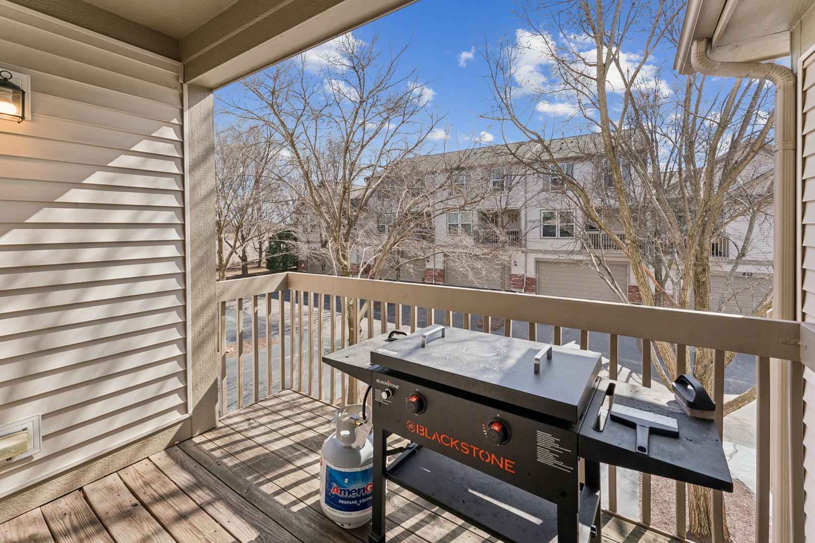 464 Valentine Way Oswego, IL 60543 - Photo 19 of 30 a view of a balcony with wooden floor and outdoor seating