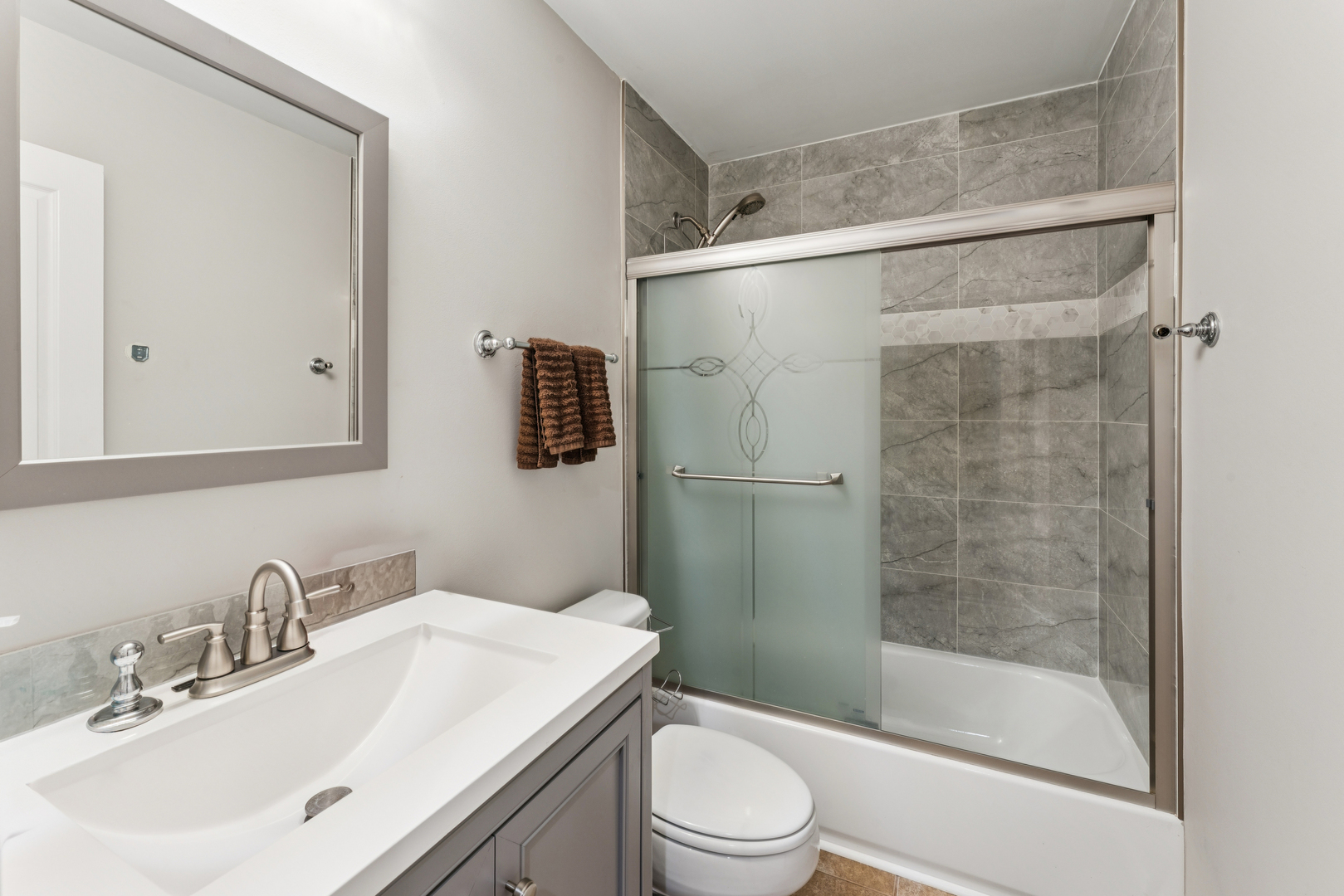 464 Valentine Way Oswego, IL 60543 - Photo 22 of 30 a bathroom with a sink toilet and shower