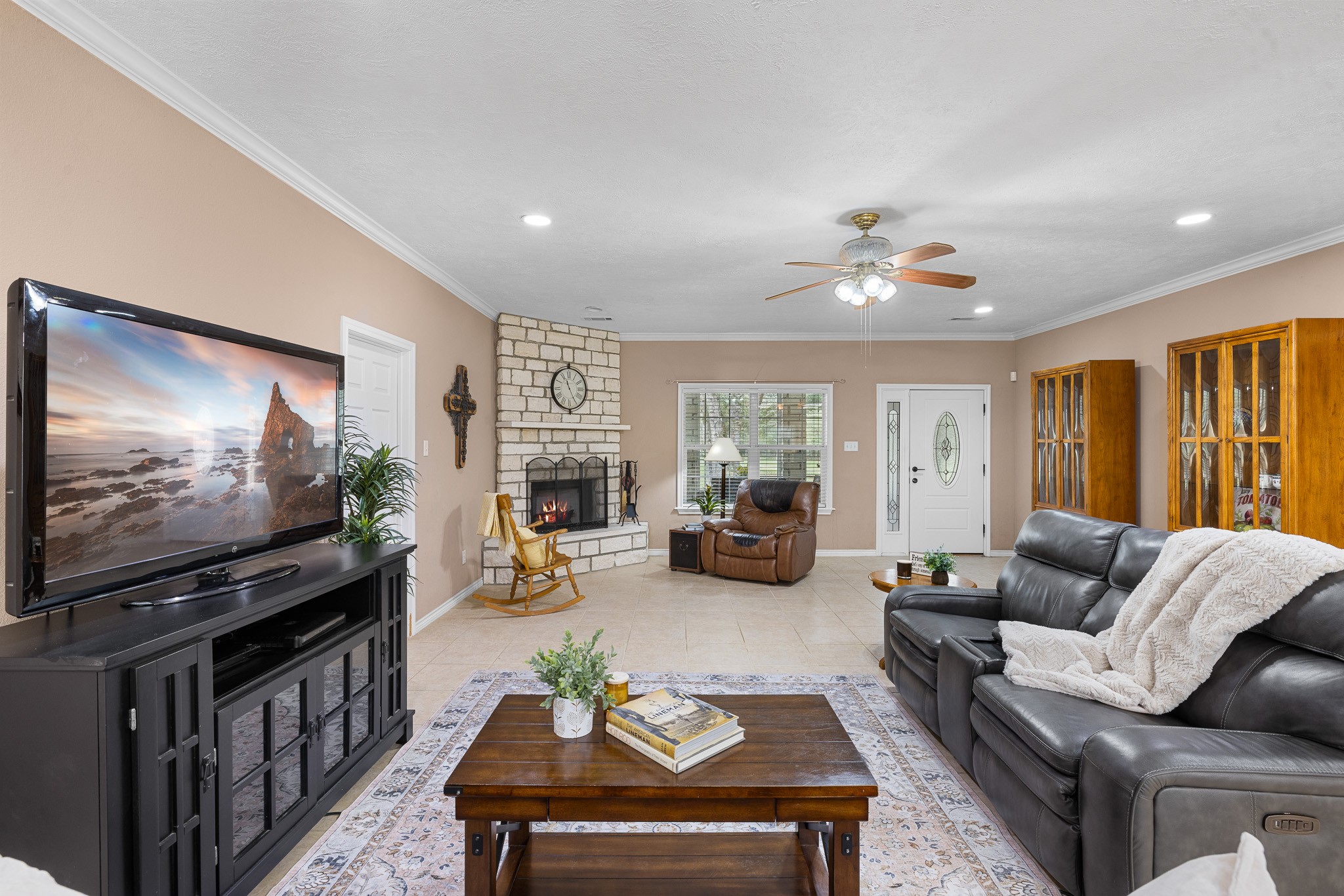 4196 Winding Road Hearne, TX 77859 - Photo 23 of 33 a living room with furniture and a flat screen tv