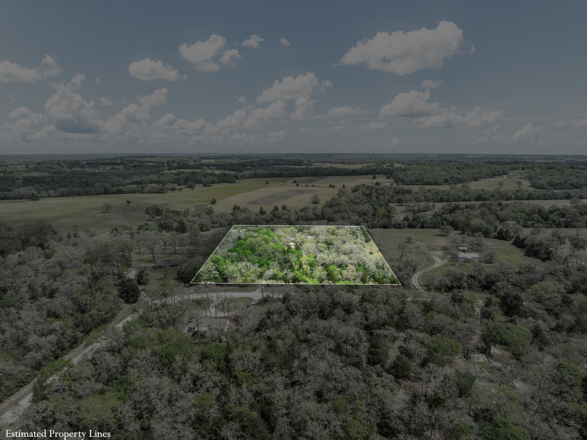 4196 Winding Road Hearne, TX 77859 - Photo 24 of 33 a view of a dry yard with wooden fence