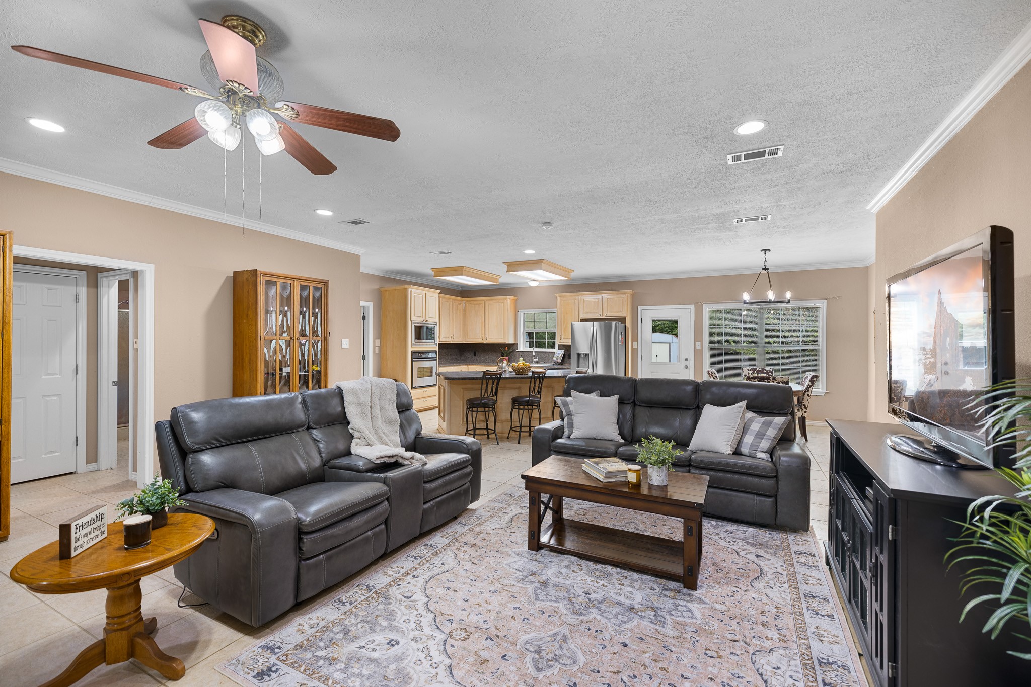 4196 Winding Road Hearne, TX 77859 - Photo 4 of 33 a living room with furniture and a large window