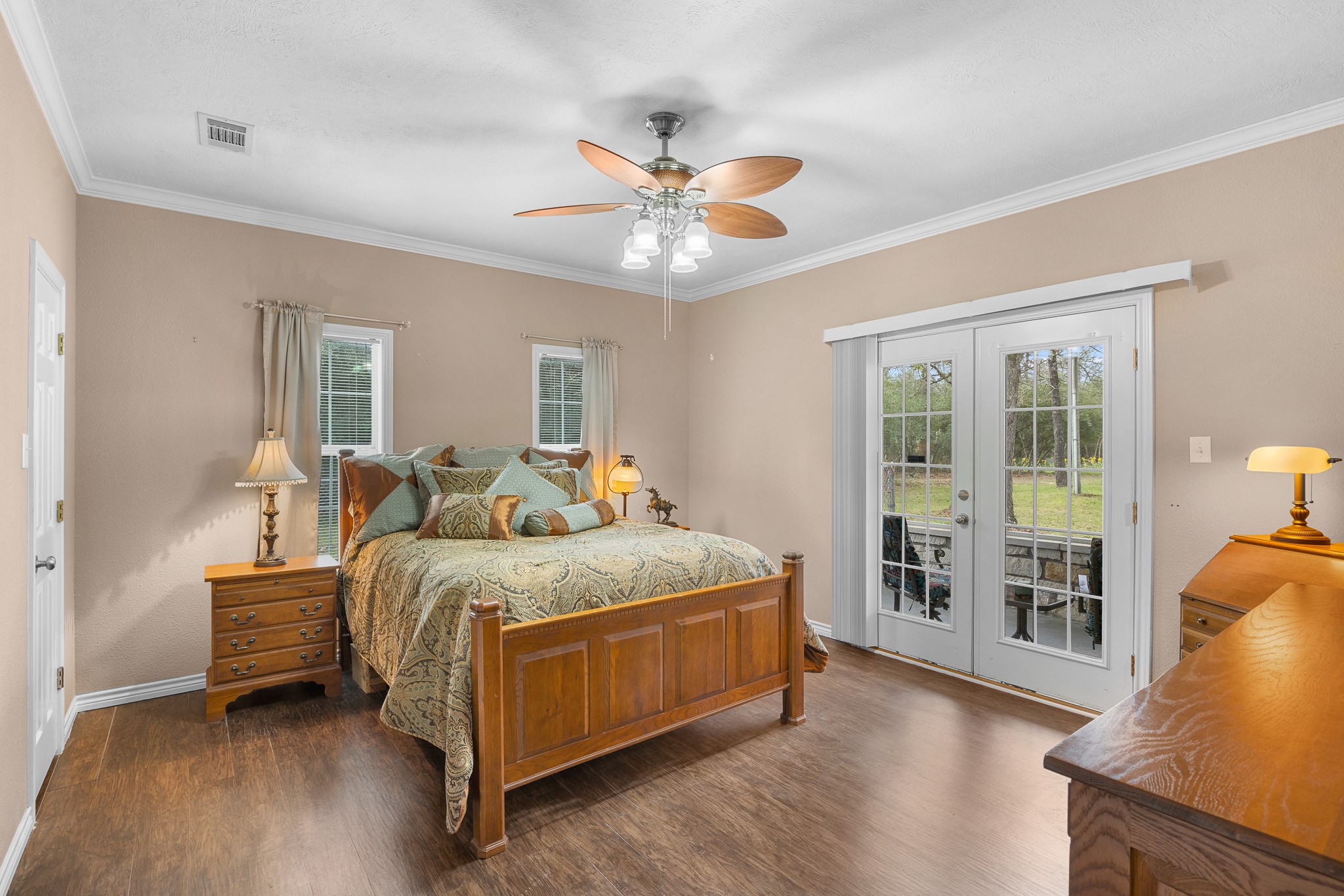 4196 Winding Road Hearne, TX 77859 - Photo 8 of 33 a spacious bedroom with a bed and a large window