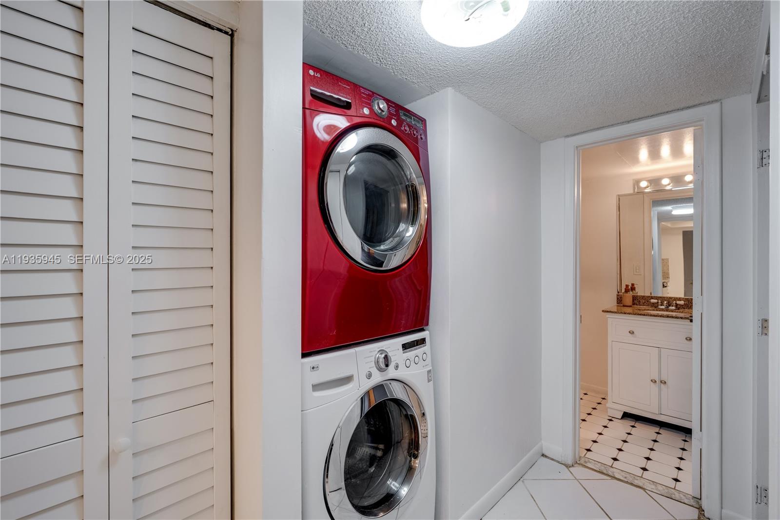 11483 Southwest 109th Road, Unit 2E Miami, FL 33176 - Photo 12 of 45 a view of a hallway with washer and dryer
