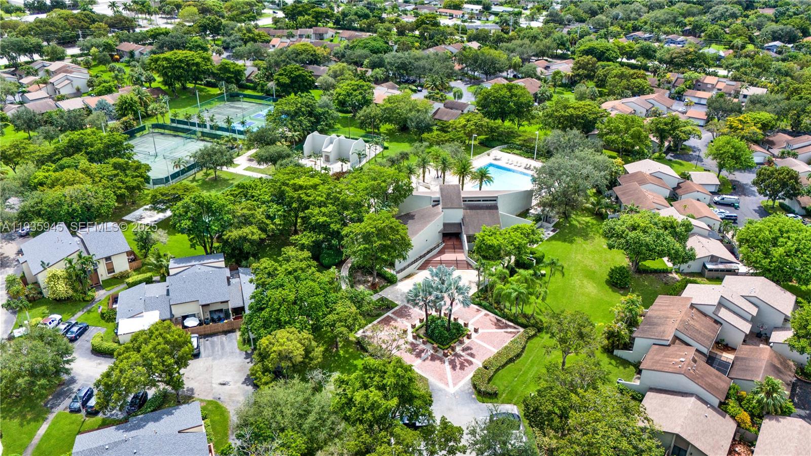 11483 Southwest 109th Road, Unit 2E Miami, FL 33176 - Photo 29 of 45 an aerial view of residential house with outdoor space and trees all around