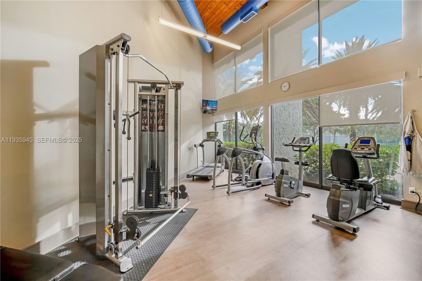 11483 Southwest 109th Road, Unit 2E Miami, FL 33176 - Photo 41 of 45 a view of a room with gym equipment