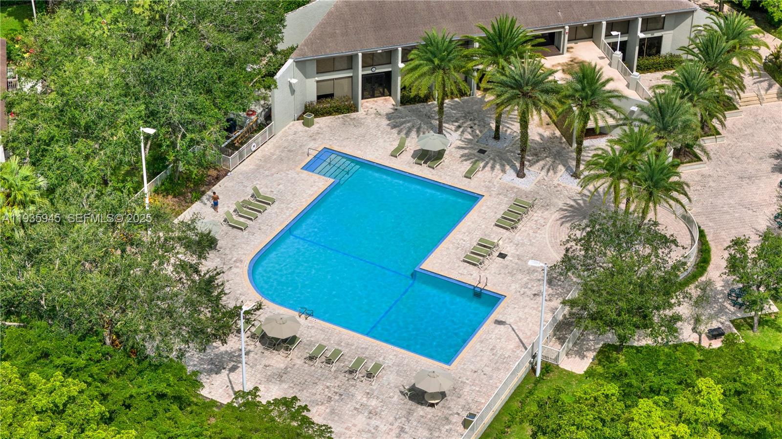 11483 Southwest 109th Road, Unit 2E Miami, FL 33176 - Photo 45 of 45 an aerial view of a house with swimming pool and garden