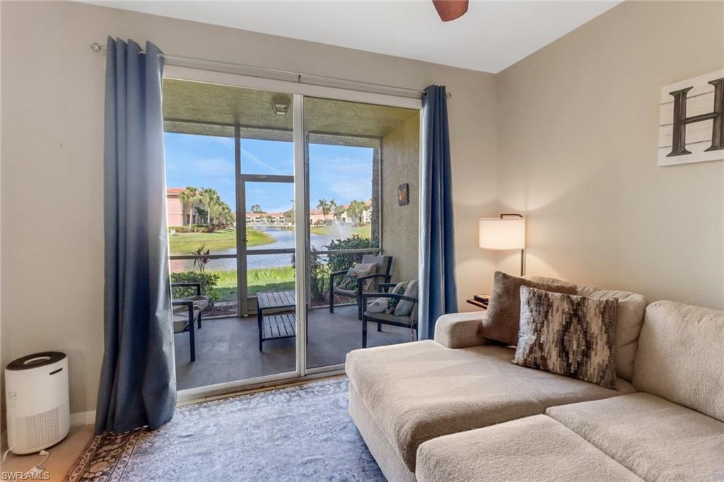 20221 Estero Gardens Circle, Unit 104 Estero, FL 33928 - Photo 11 of 43 a living room with furniture