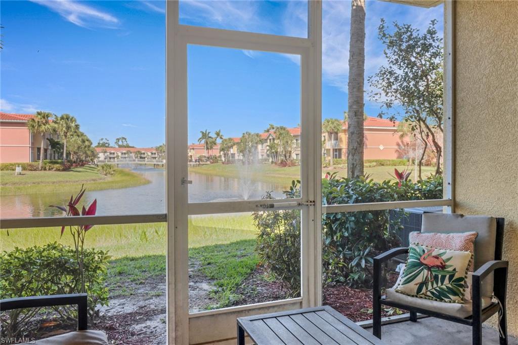 20221 Estero Gardens Circle, Unit 104 Estero, FL 33928 - Photo 22 of 43 a view of a city from a balcony
