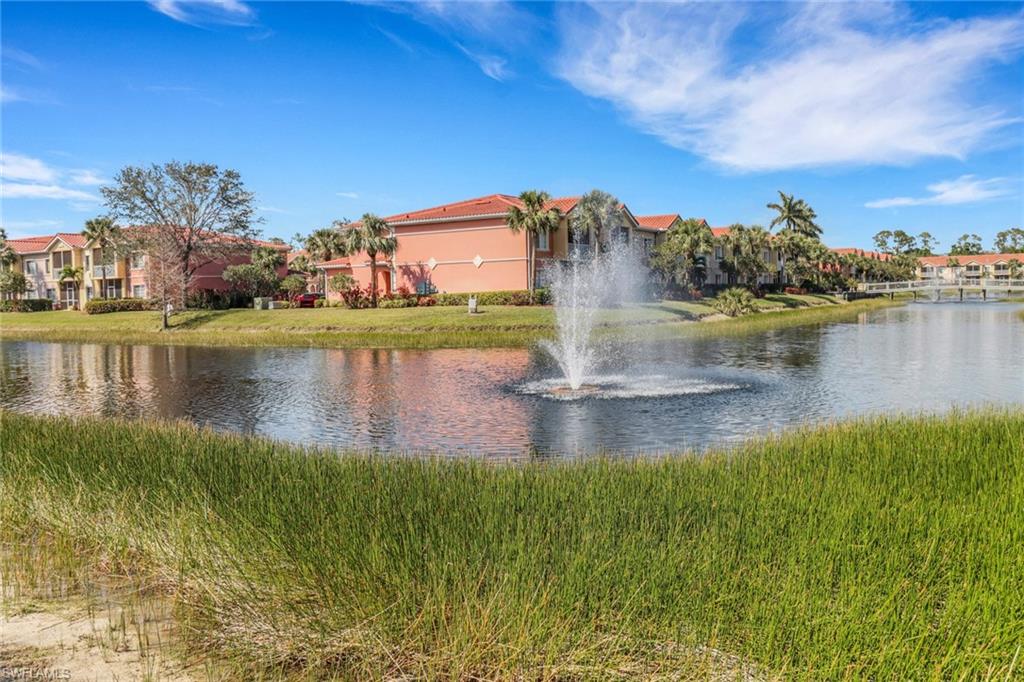 20221 Estero Gardens Circle, Unit 104 Estero, FL 33928 - Photo 26 of 43 a view of a water fountain and an outdoor space