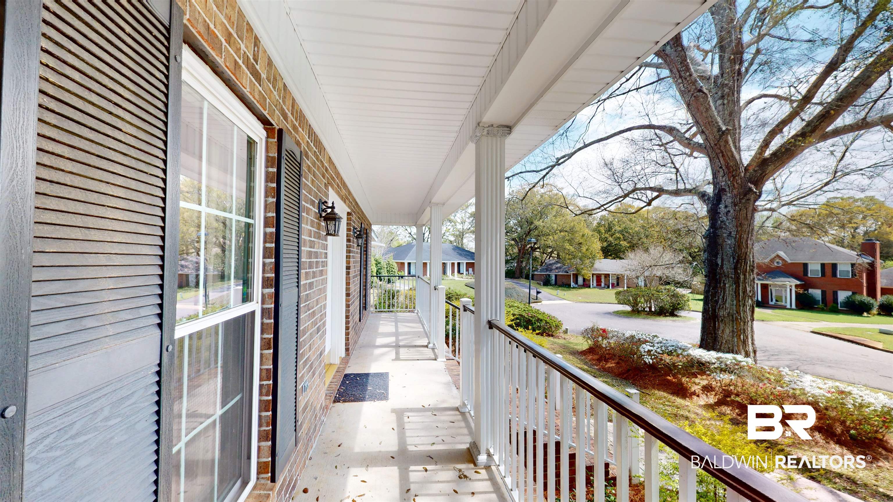 7310 Cheryl Court Mobile, AL 36695 - Photo 3 of 23 Balcony - View of the quiet cul de sac from the front porch.