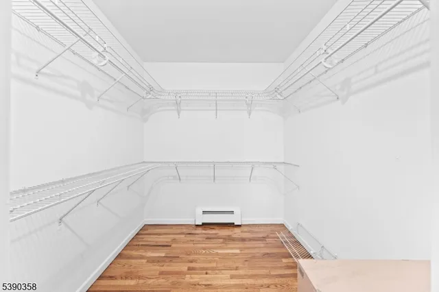 a view of a room with racks on the wall