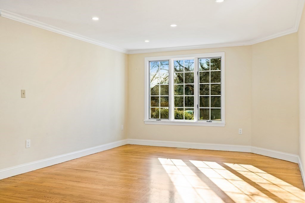 70 Thistle Patch Way, Unit 70 Hingham, MA 02043 - Photo 11 of 41 a view of an empty room with a window
