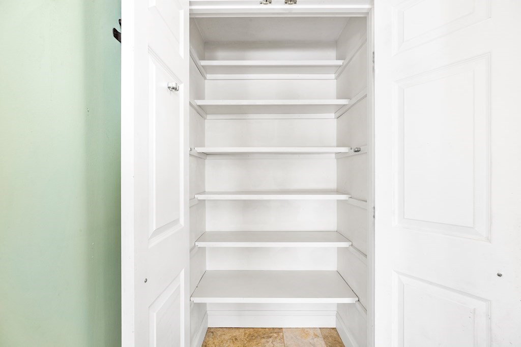 70 Thistle Patch Way, Unit 70 Hingham, MA 02043 - Photo 19 of 41 a view of a hallway with white walls