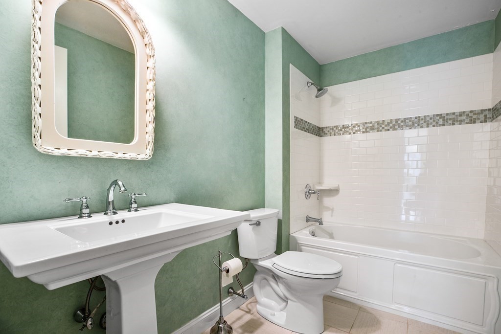 70 Thistle Patch Way, Unit 70 Hingham, MA 02043 - Photo 21 of 41 a bathroom with a sink a toilet and a mirror