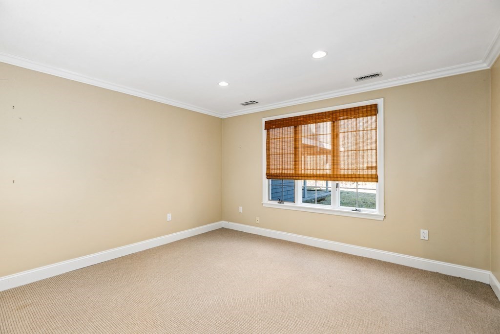 70 Thistle Patch Way, Unit 70 Hingham, MA 02043 - Photo 31 of 41 an empty room with a window