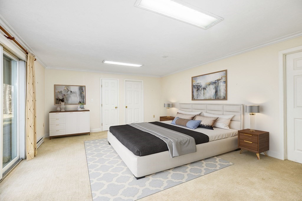 70 Thistle Patch Way, Unit 70 Hingham, MA 02043 - Photo 32 of 41 a spacious bedroom with a bed and a view of bedroom