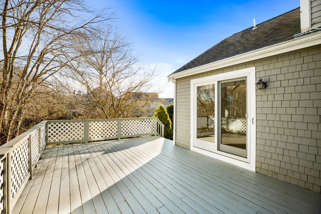 70 Thistle Patch Way, Unit 70 Hingham, MA 02043 - Photo 5 of 41 a view of a wooden deck