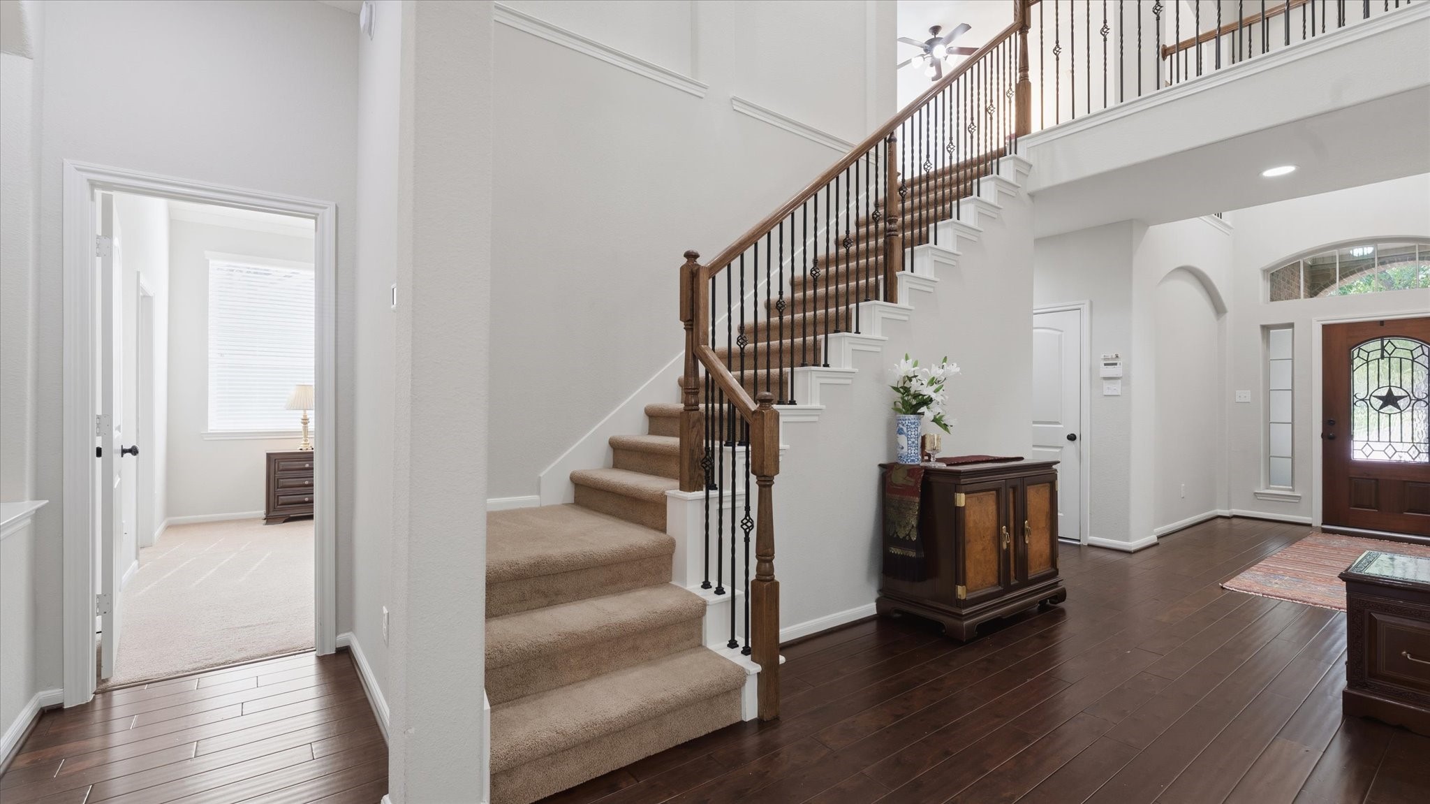 14 Painted Post Place Spring, TX 77389 - Photo 24 of 43 a view of entryway and hall with wooden floor