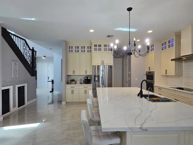 a living room with furniture window and flat screen tv