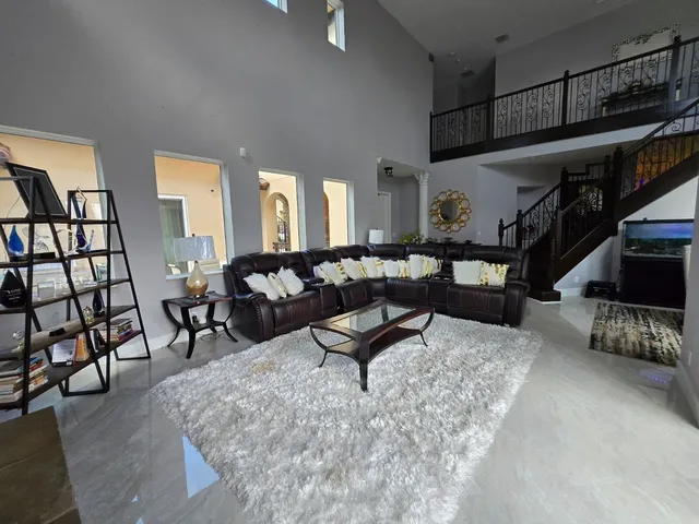 a kitchen with cabinets and window