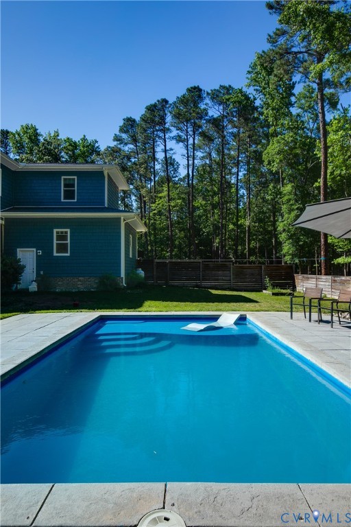9749 Hoke Brady Road Henrico, VA 23231 - Photo 42 of 53 a view of pool with lawn chairs and plants