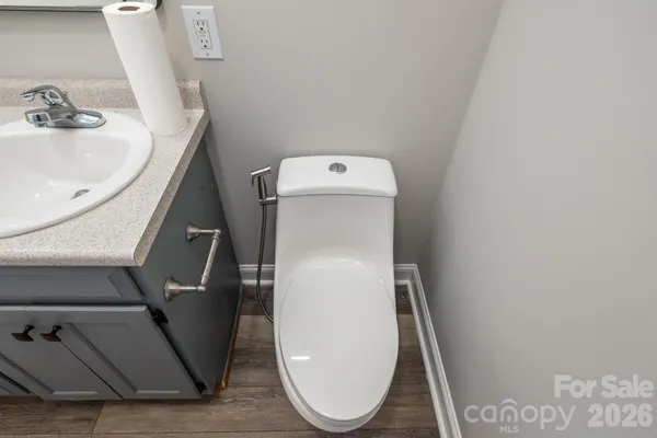 a bathroom with a sink and toilet