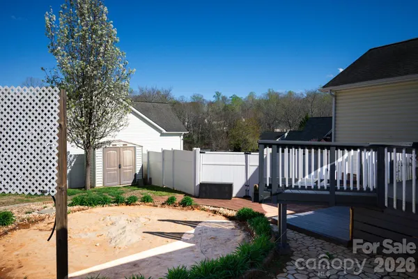 a view of a deck with a yard