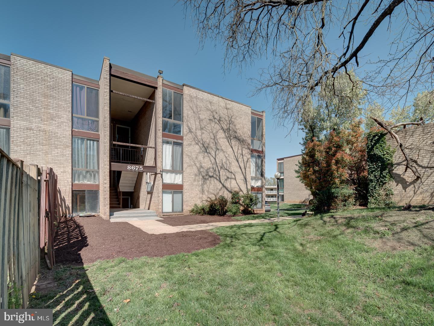 8675 Greenbelt Road, Unit 202 Greenbelt, MD 20770 - Photo 2 of 47 a view of a back yard of the house